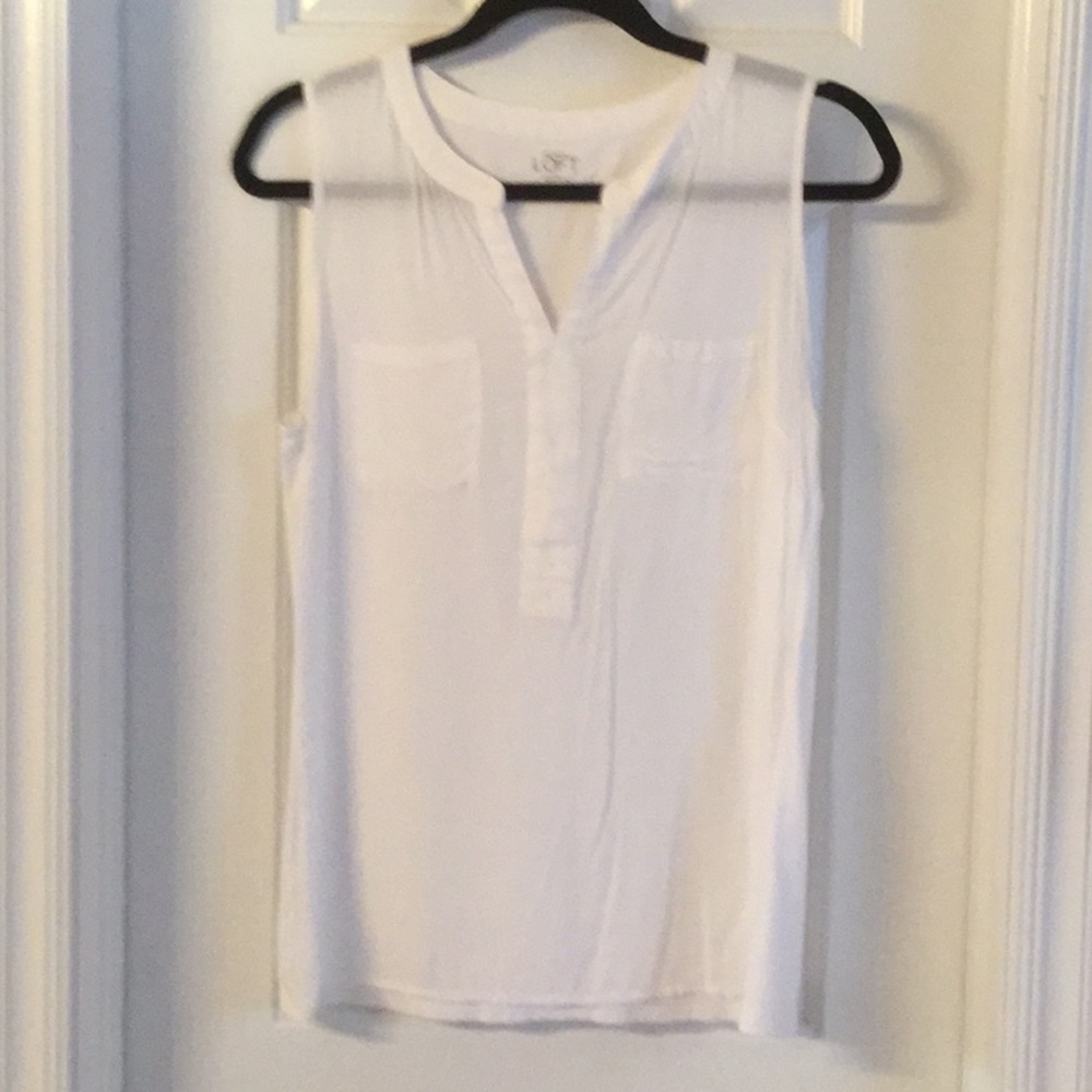 Sleeveless white blouse